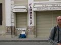 ecuador-cuenca-women-sitted-by-farmacia